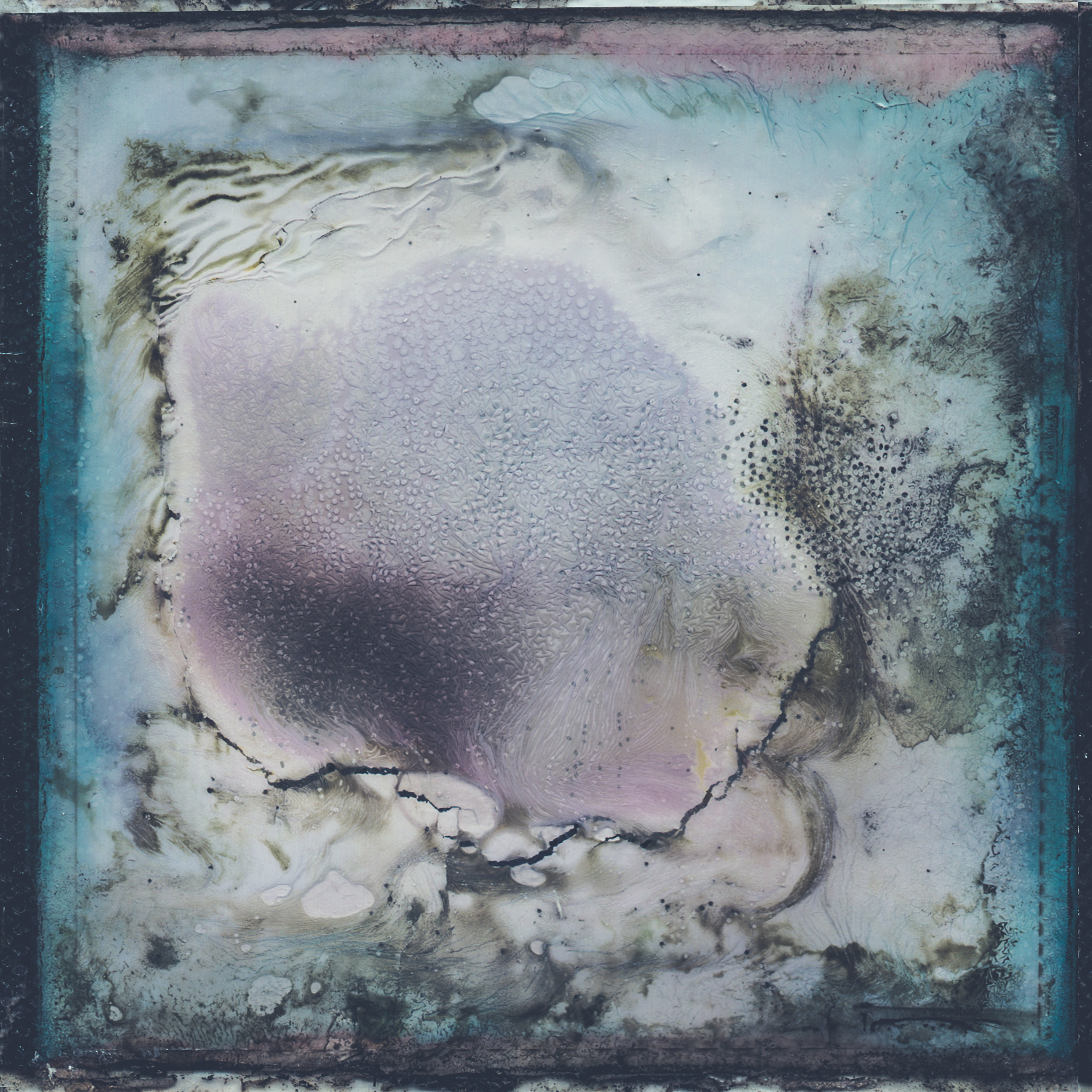 A Polaroid image that has been decayed through a chemical soak.